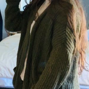 Small dark green sweater